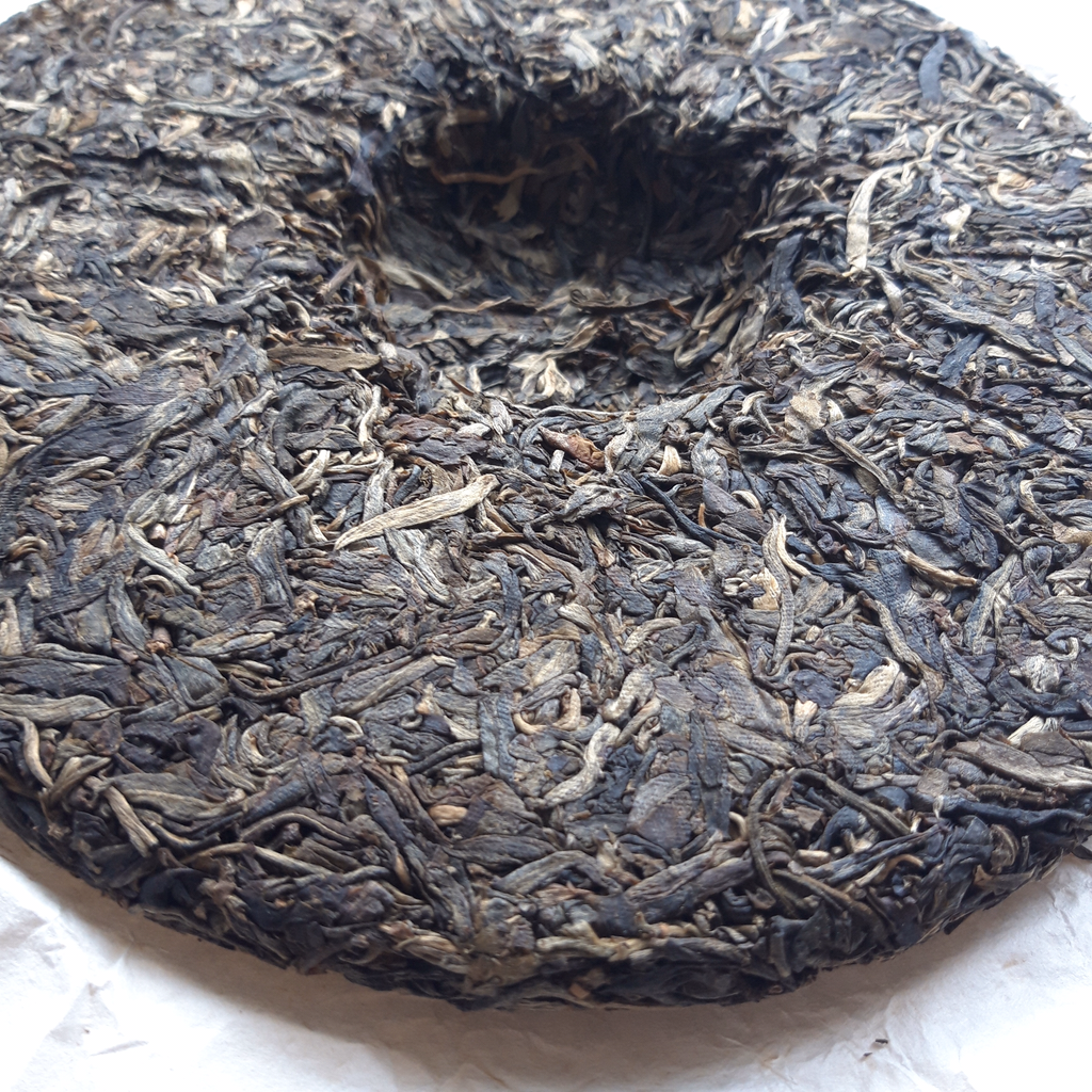 He Kai Shan Sheng Pu-erh 2014