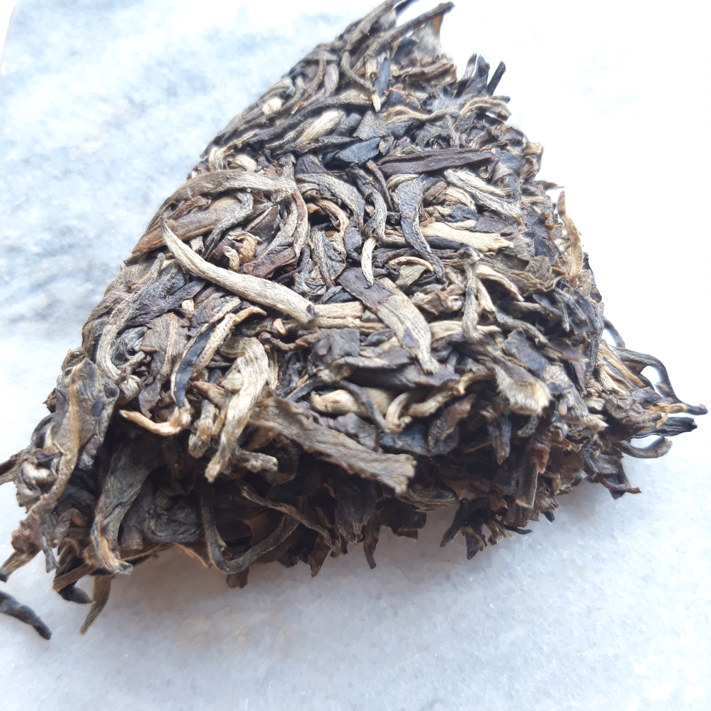 He Kai Shan Sheng Pu-erh 2014