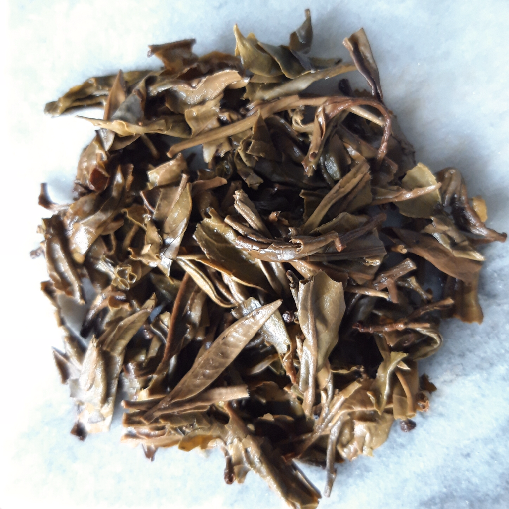 He Kai Shan Sheng Pu-erh 2014